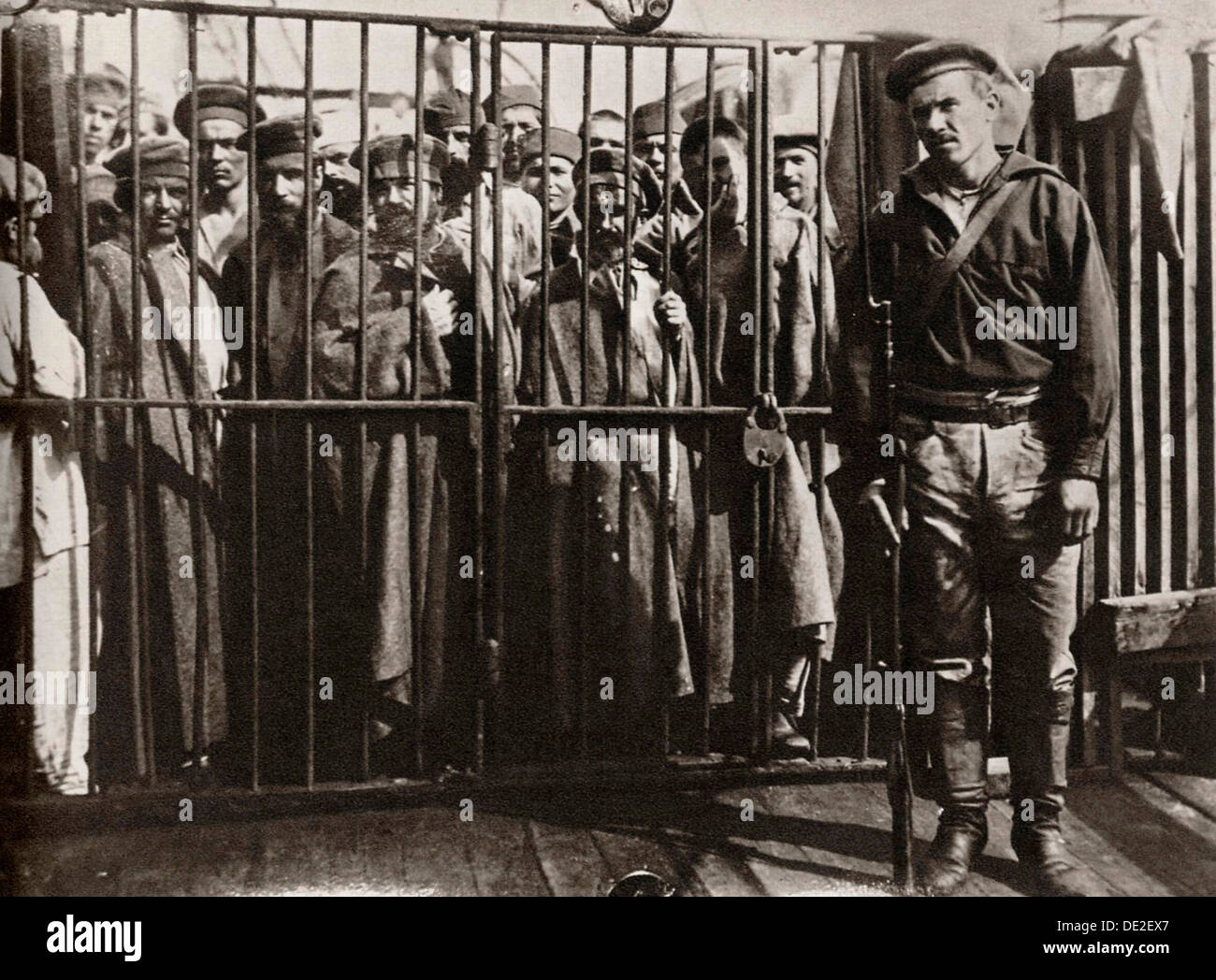 Caged prisoners cage on the steamer 'Petersburg' on the way to Sakhalin, Russia, 1890. Artist: Anton Chekhov Stock Photo