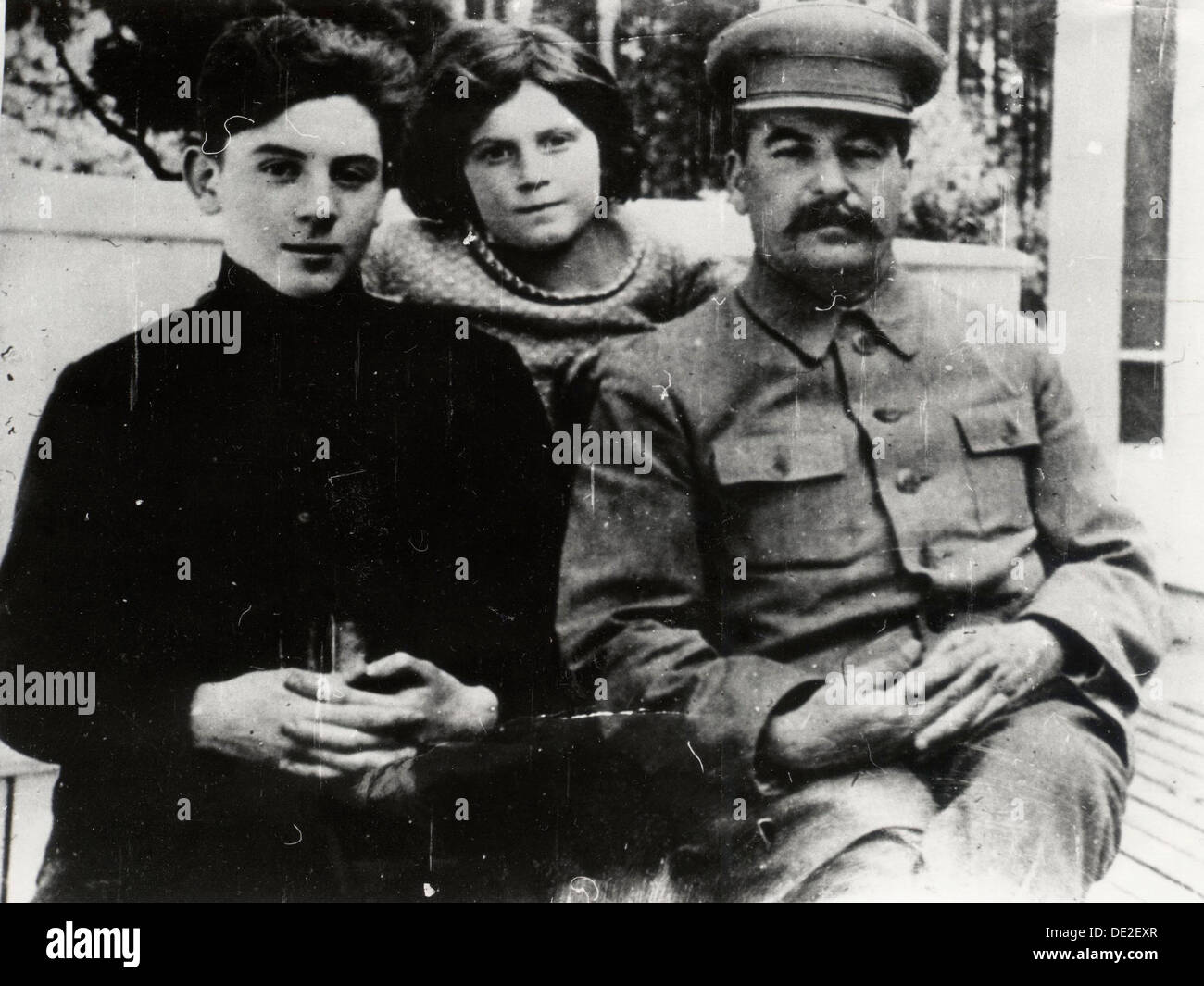 Soviet leader Josef Stalin with his son Vasily and daughter Svetlana, 1930s.  Artist: Pyotr Otsup. Stock Photo