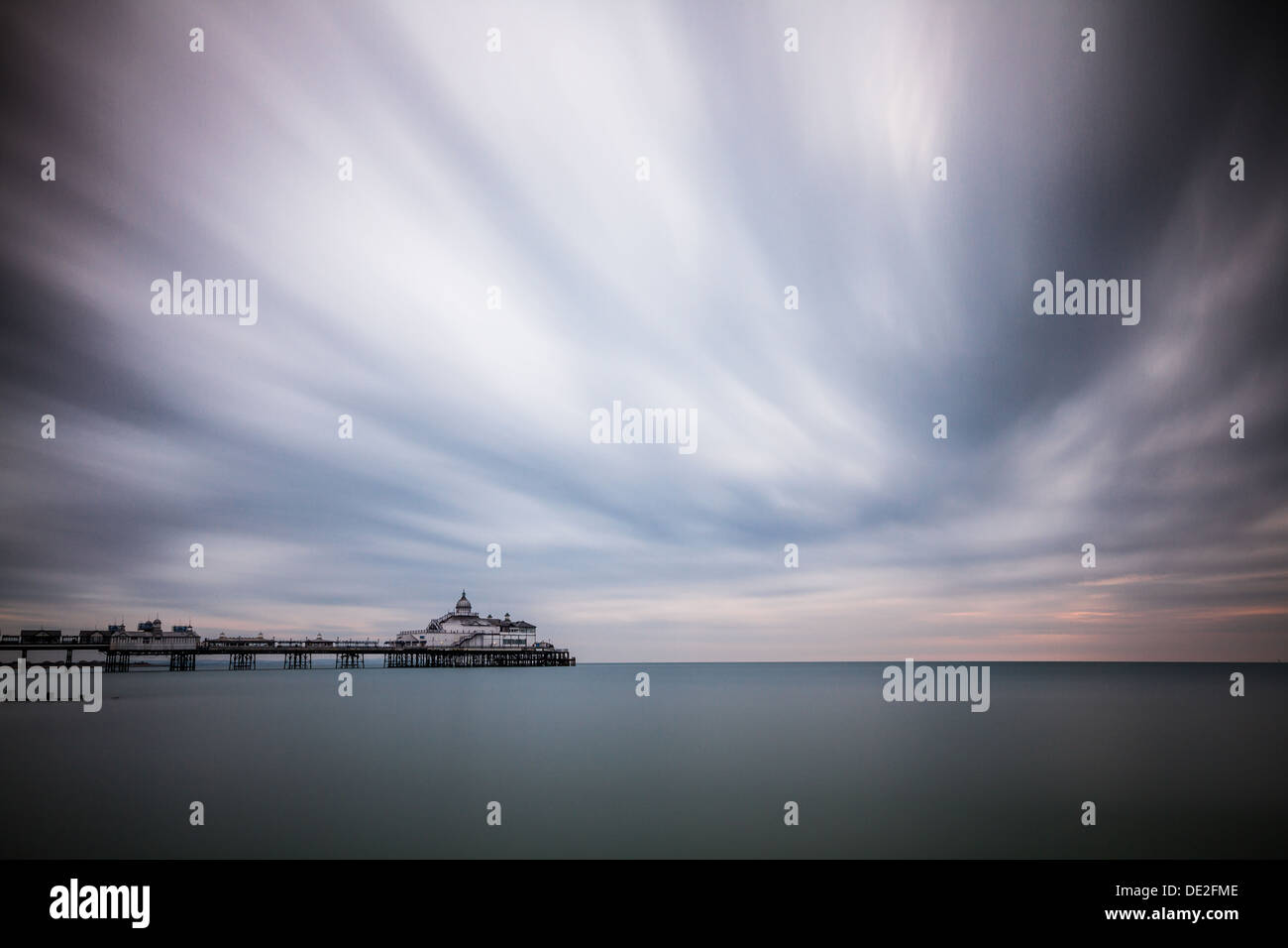10 minute long exposure of Eastbourne Pier during sunrise Stock Photo