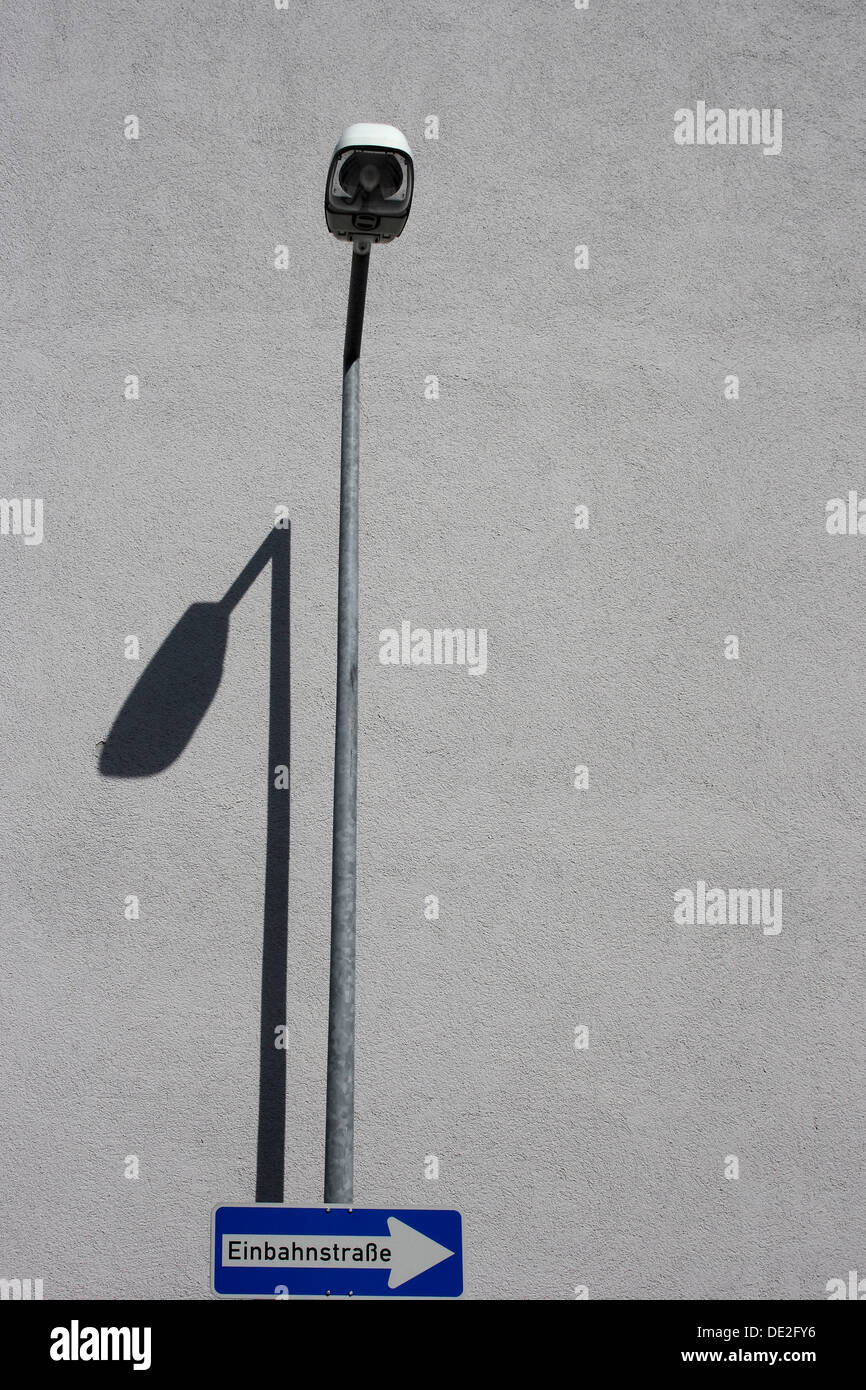 Traffic sign and street light Stock Photo - Alamy