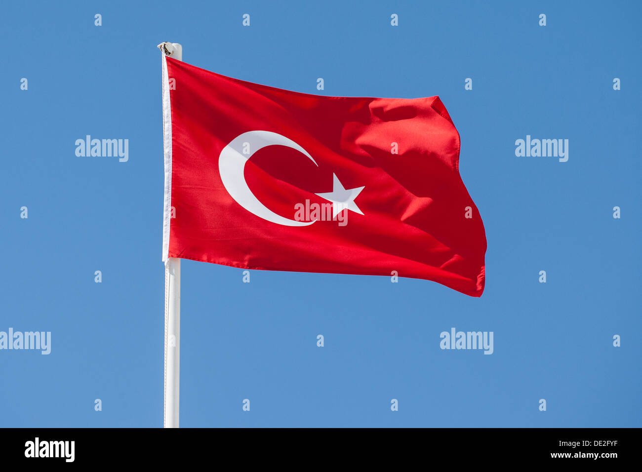 Flag of Turkey against a blue sky Stock Photo