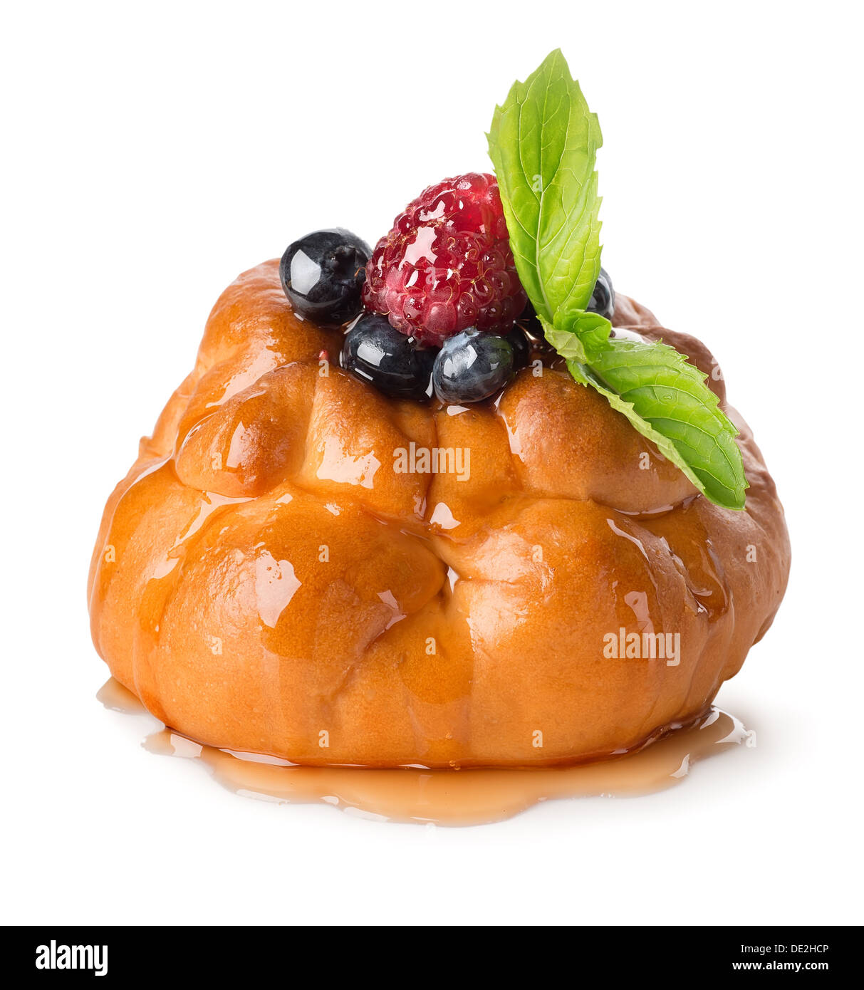 Sweet bun with berries and mint isolated on white Stock Photo