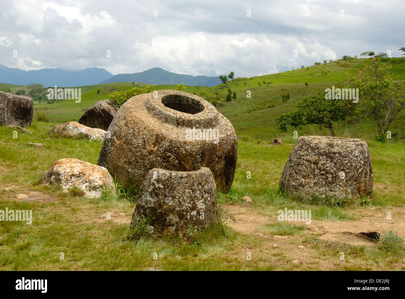 Archeology, ancient stone jars in the landscape, Jar Site 1, Hai Hin Phu Salato, Plain of Jars, near Phonsavan Stock Photo