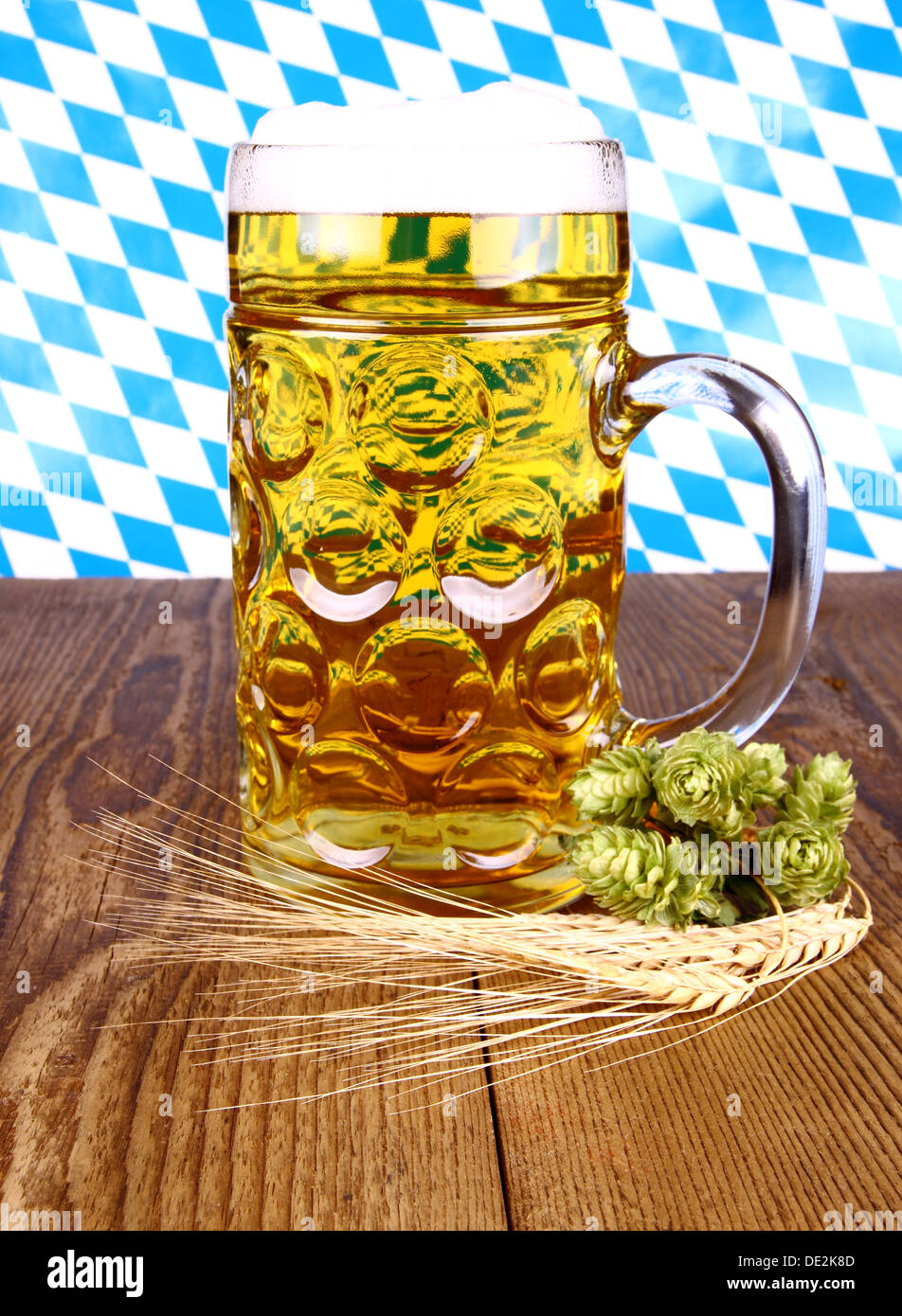 Bavarian beer, wheat and hop on wooden background, close up Stock Photo