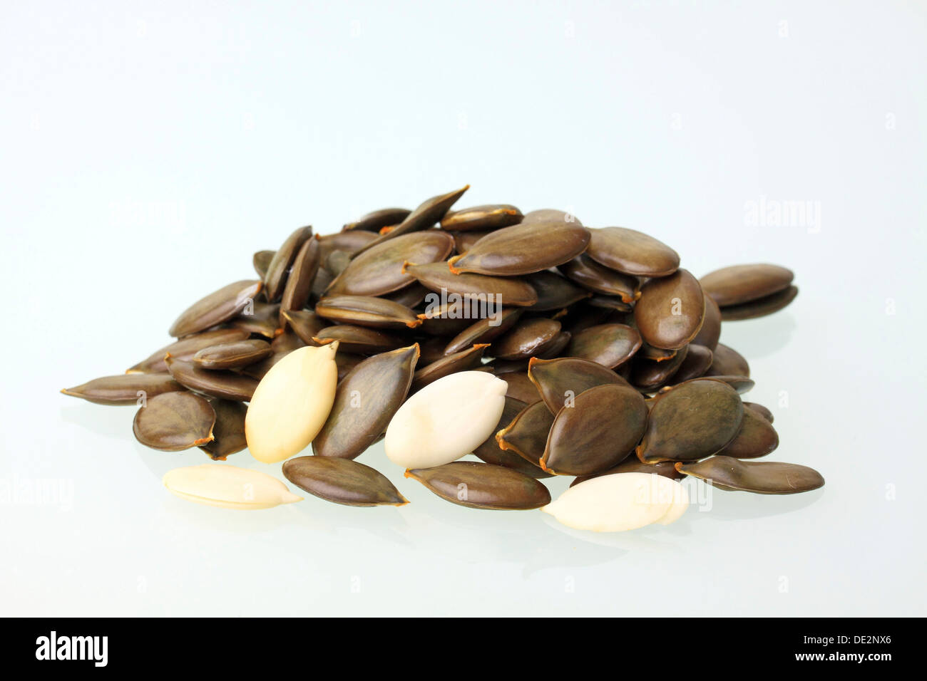 Peeled and unpeeled Styrian Oil Pumpkin seeds Stock Photo