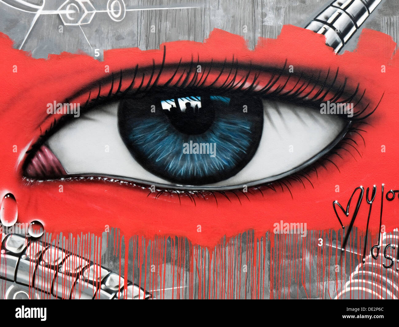 large artwork of an eye painted onto an outside wall southsea england uk Stock Photo Alamy