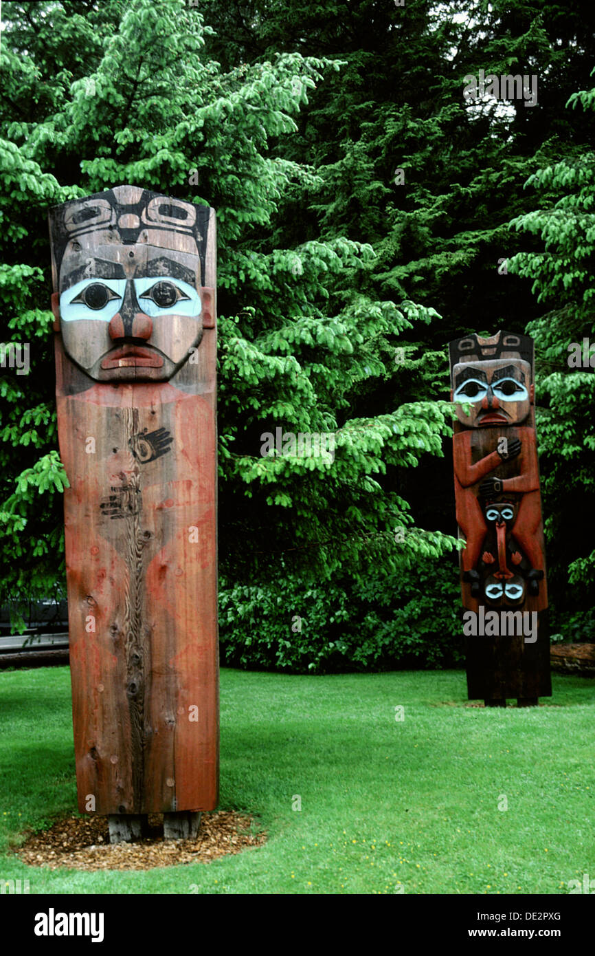 House posts with totems from the village of Kasaan Stock Photo Alamy