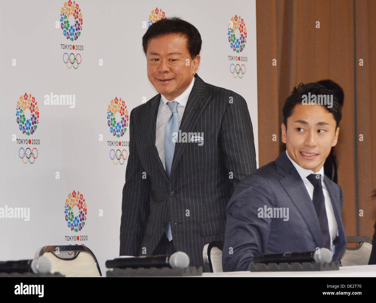 Tokyo, Japan. 10th Sep, 2013. Gov. Naoki Inose, left, of Tokyo arrives ...