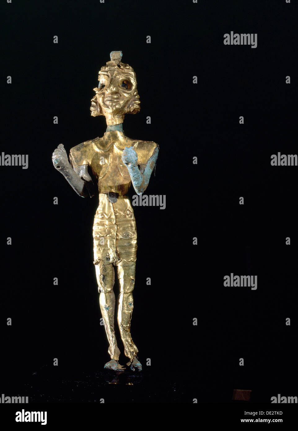 Canaanite gold and silver foil covered bronze figure of Ba'al. Stock Photo
