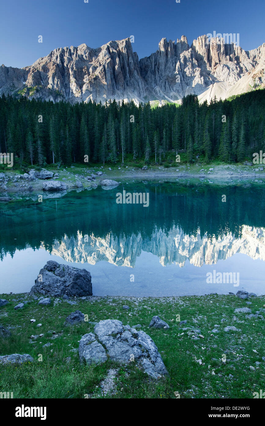 Lake Carezza with Latemar Mountain, Karerpass, Dolomiten, South Tyrol province, Trentino-Alto Adige, Italy Stock Photo