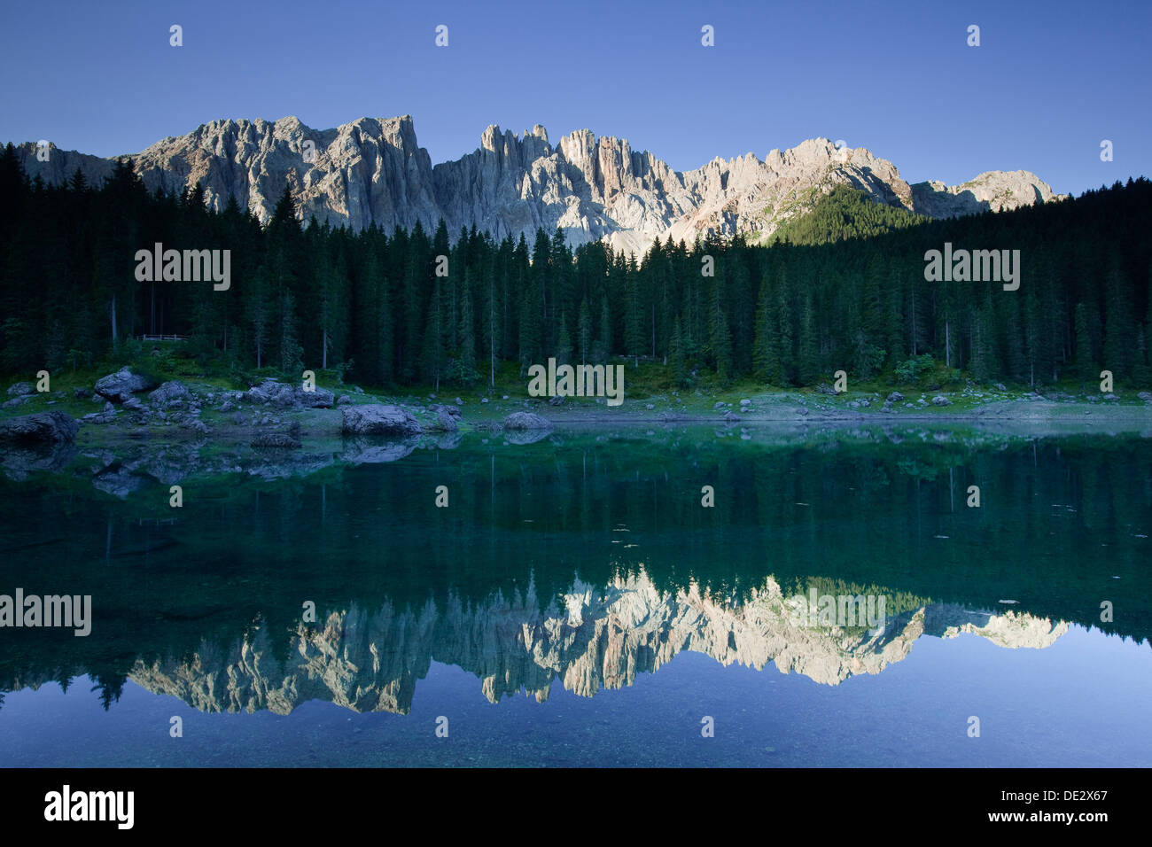 Lake Carezza with Latemar Mountain, Karerpass, Dolomiten, South Tyrol province, Trentino-Alto Adige, Italy Stock Photo