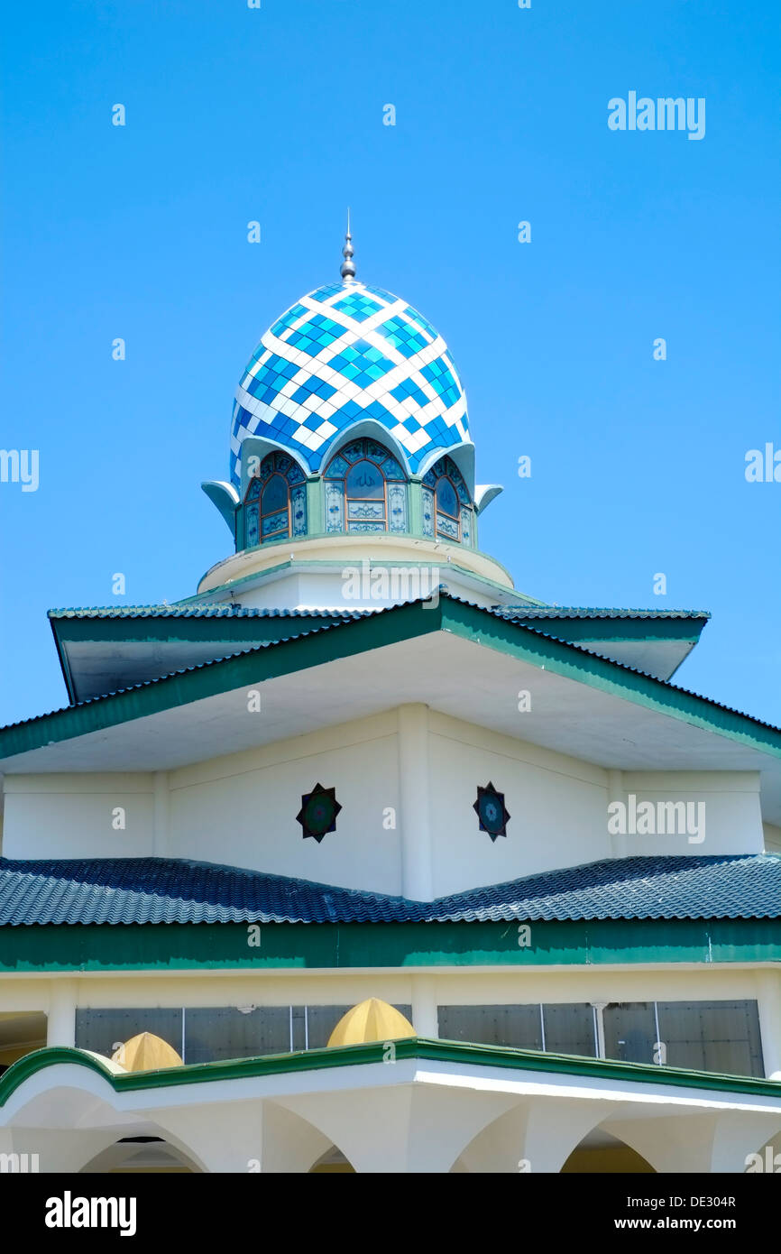 minaret and modern design of a mosque in the town center of kediri java indonesia Stock Photo