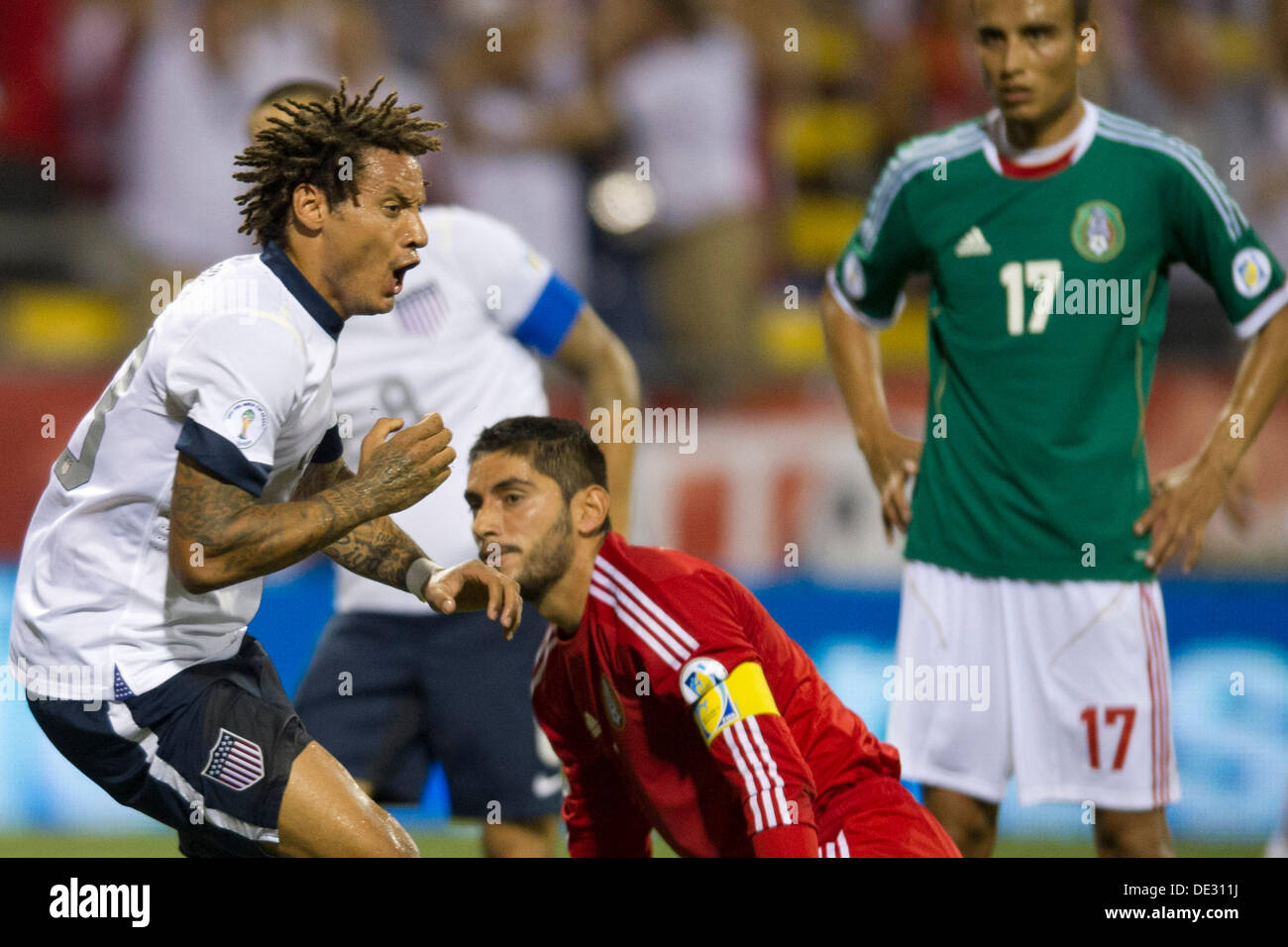 Columbus, Ohio, USA. 10th Sep, 2013. September 10, 2013: Mexico National Team goalkeeper Jose de Jesus Corona (1) is disappointed and Mexico National Team midfielder Jesus Zavala (17) looks on as US Men's National Team midfielder Jermaine Jones (13) celebrates after the first goal was scored during the U.S. Men's National Team vs. Mexico National Team- World Cup Qualifier match at Columbus Crew Stadium - Columbus, OH. The United States Men's National Team defeated The Mexico National Team 2-0 and clinched a spot for the World Cup in Brazil. Credit:  csm/Alamy Live News Stock Photo