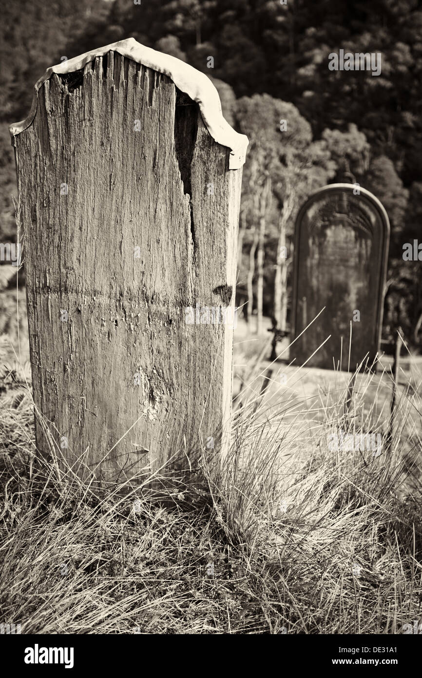 An old wooden grave headstone Stock Photo