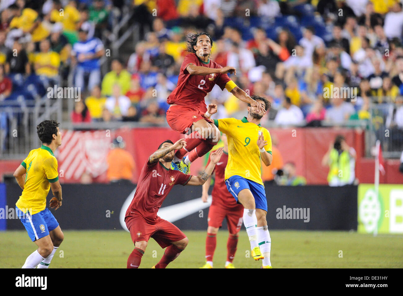 Foxborough, Massachusetts, USA. 10th Sep, 2013. September 10 , 2013 - Foxborough, Massachusetts, U.S. - Portugal's Bruno Alves (2) aims to head the ball during the FIFA friendly match between Brazil and Portugal held at Gillette Stadium in Foxborough Massachusetts. Final score Brazil 3 Portugal 1 Eric Canha/CSM. Credit:  csm/Alamy Live News Stock Photo