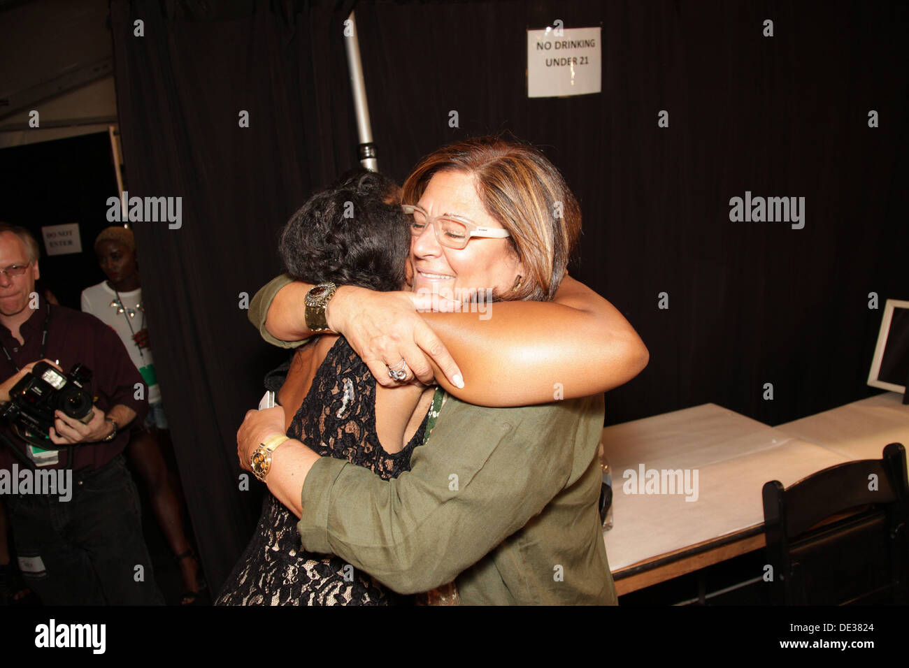 September 8, 2013 - New York, New York, U.S. - Fashion designer TRACY REESE  (black lace dress) gets a hug backstage at Mercedes-Benz Spring 2014  Fashion Week New York. (Credit Image:
