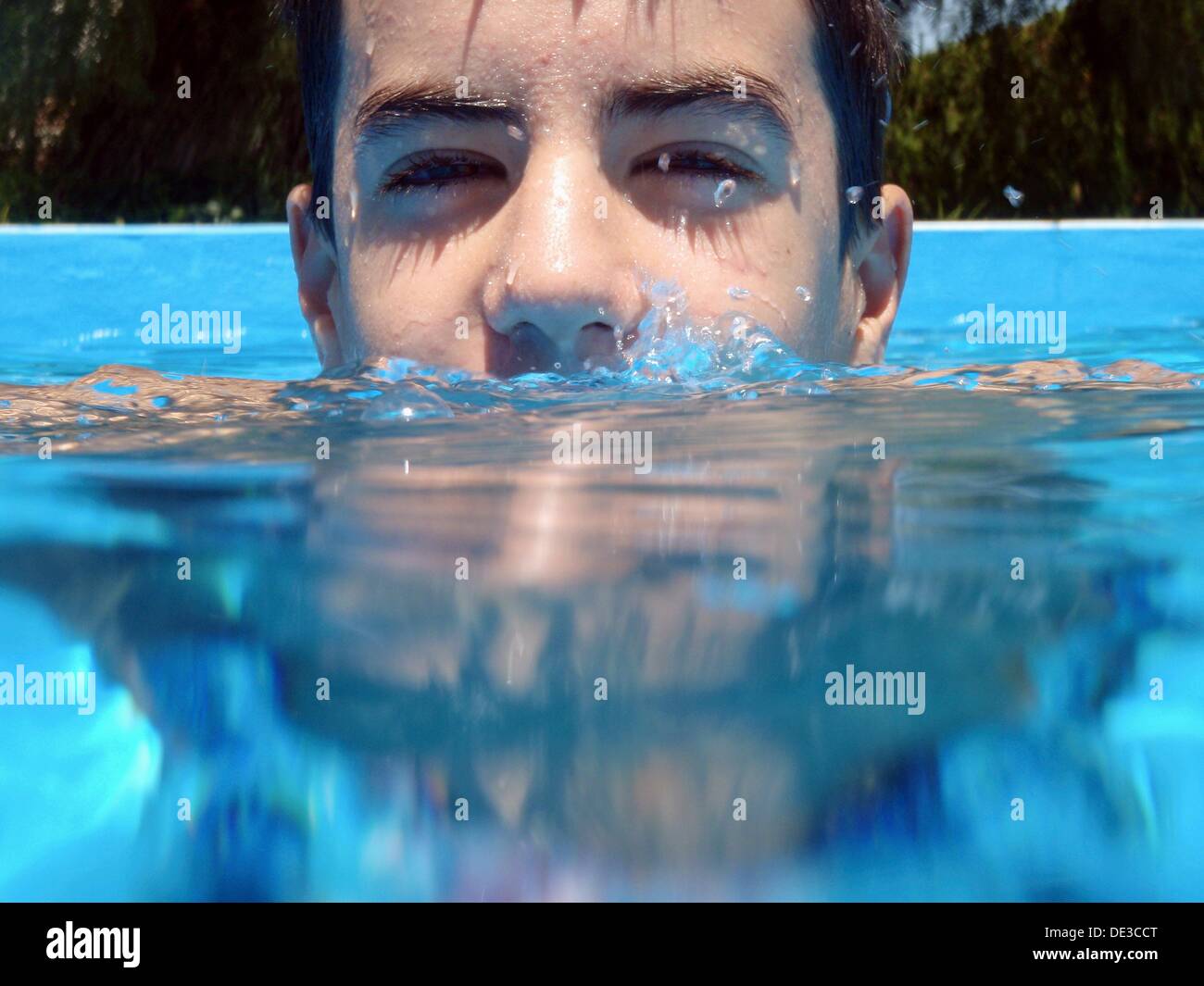 13 years old boy in swimming pool Stock Photo Alamy