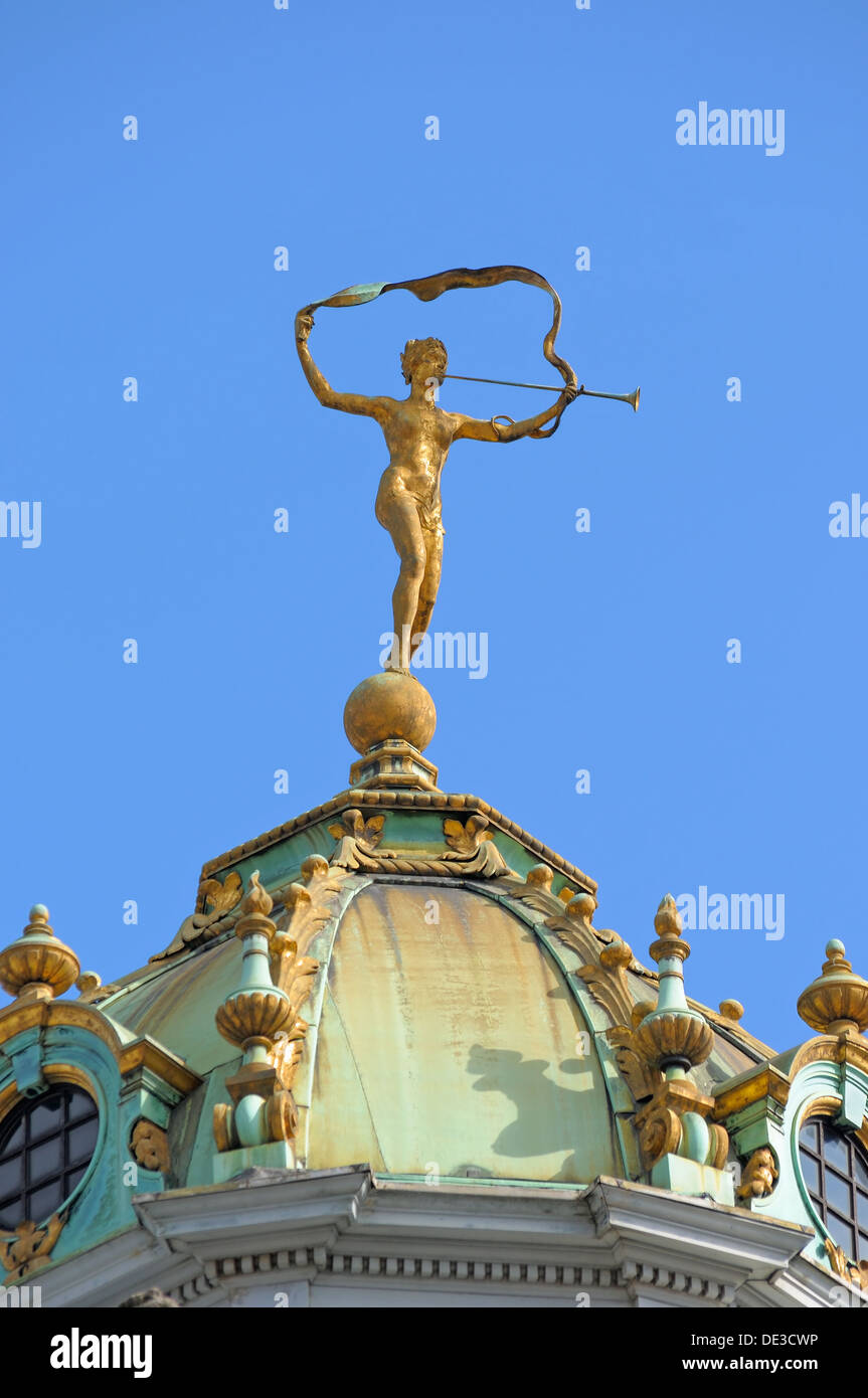 Antique style golden statue on renaissance lantern tower of historical building Maison du Roi d'Espagne on Grand Place, Brussels Stock Photo