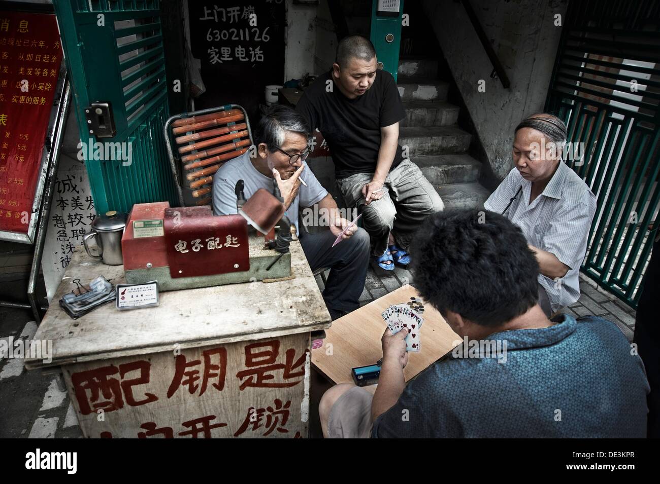 Men playing cards in the street of Shanghai. China country Stock Photo -  Alamy