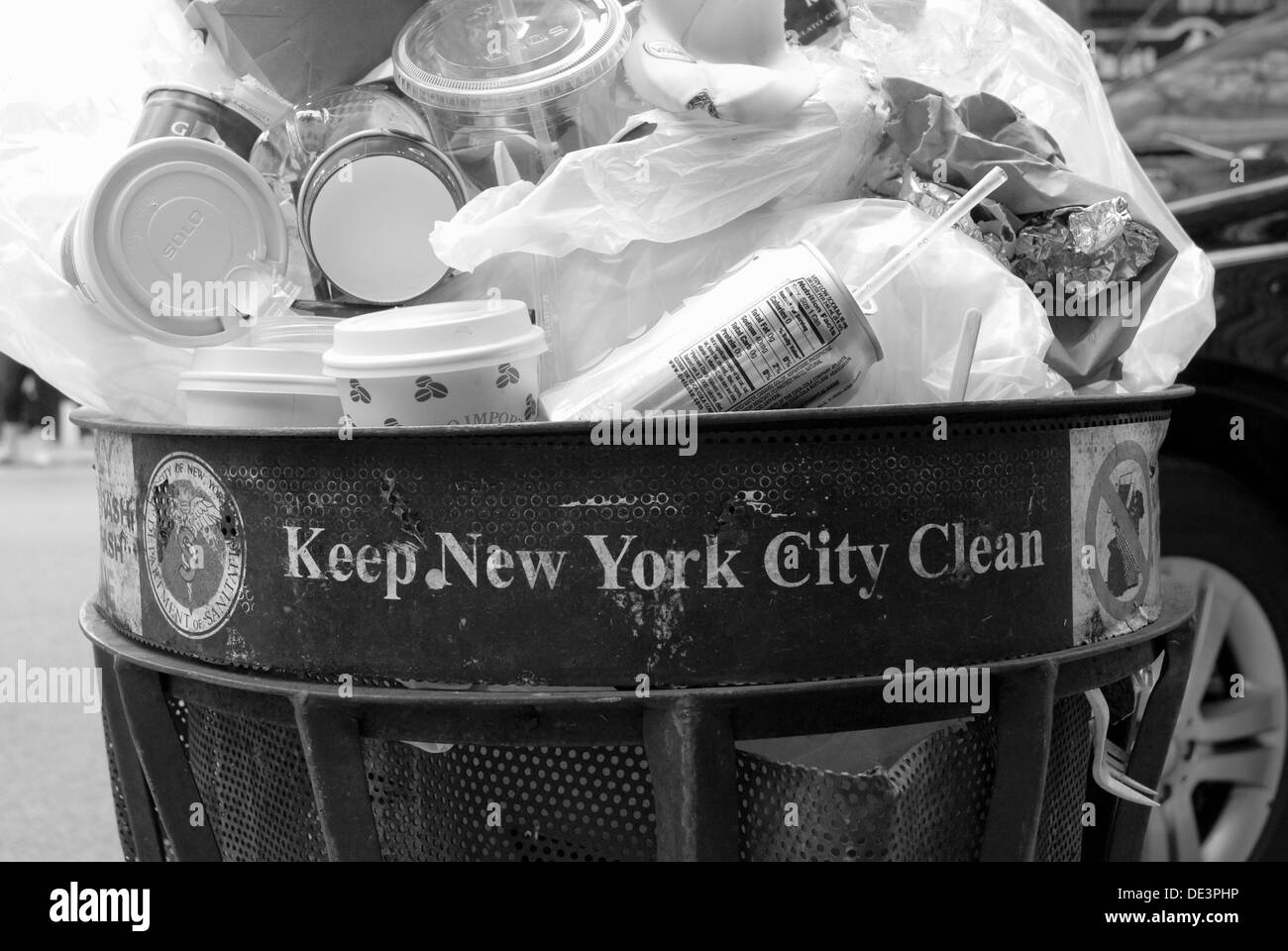 A full garbage Can in New York City Stock Photo Alamy