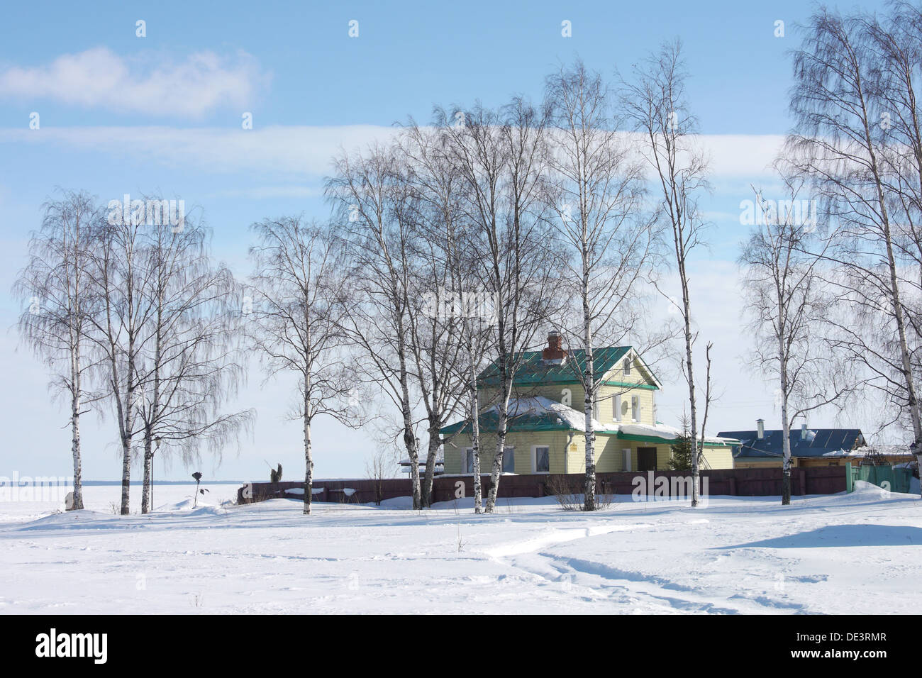 a small wooden house in a snowy forest Stock Photo - Alamy
