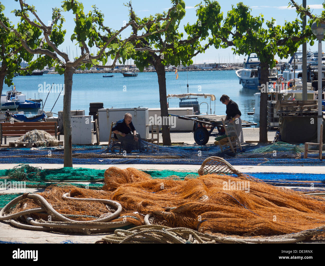 Two elderly Spanish ladies making fishing nets Stock Photo Alamy