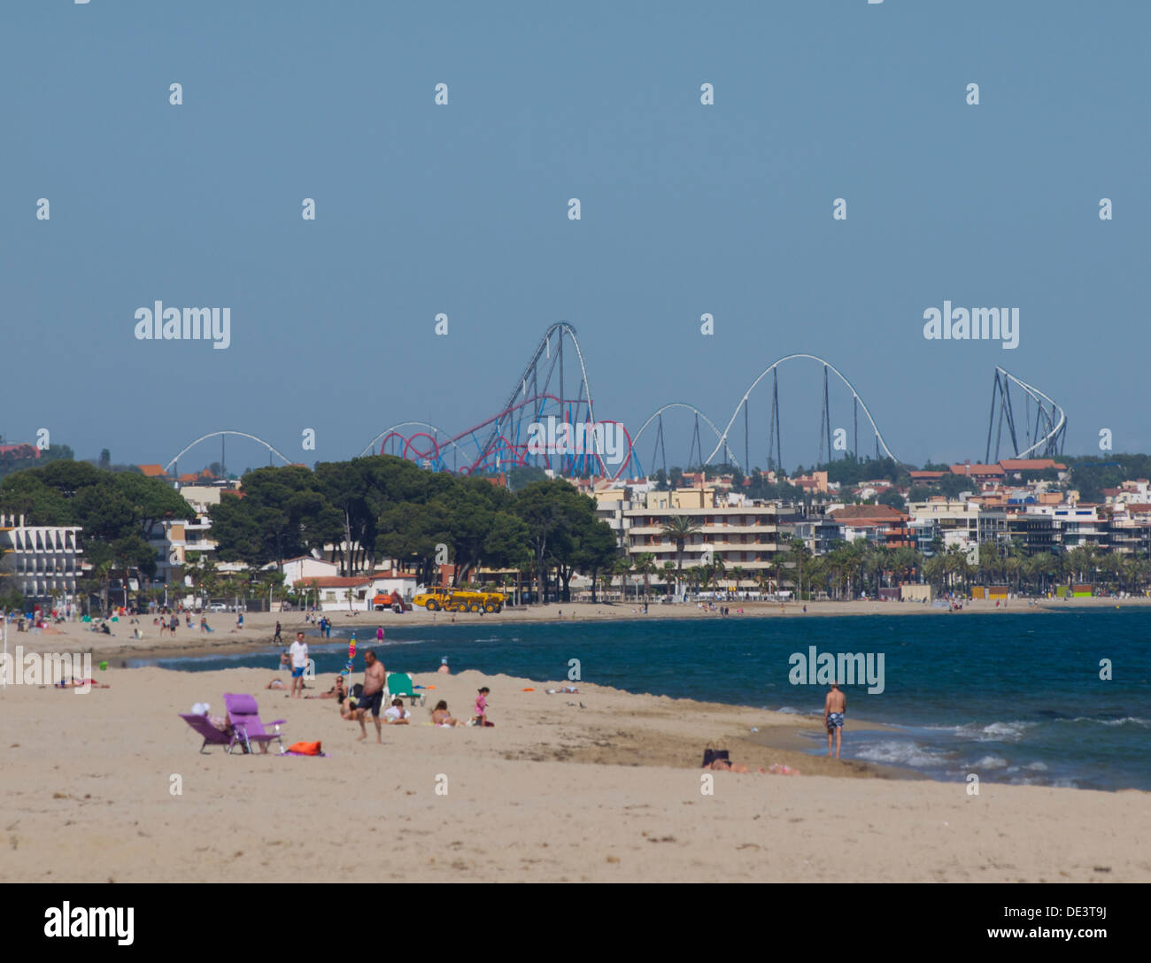 Beach with a theme park in the background Stock Photo