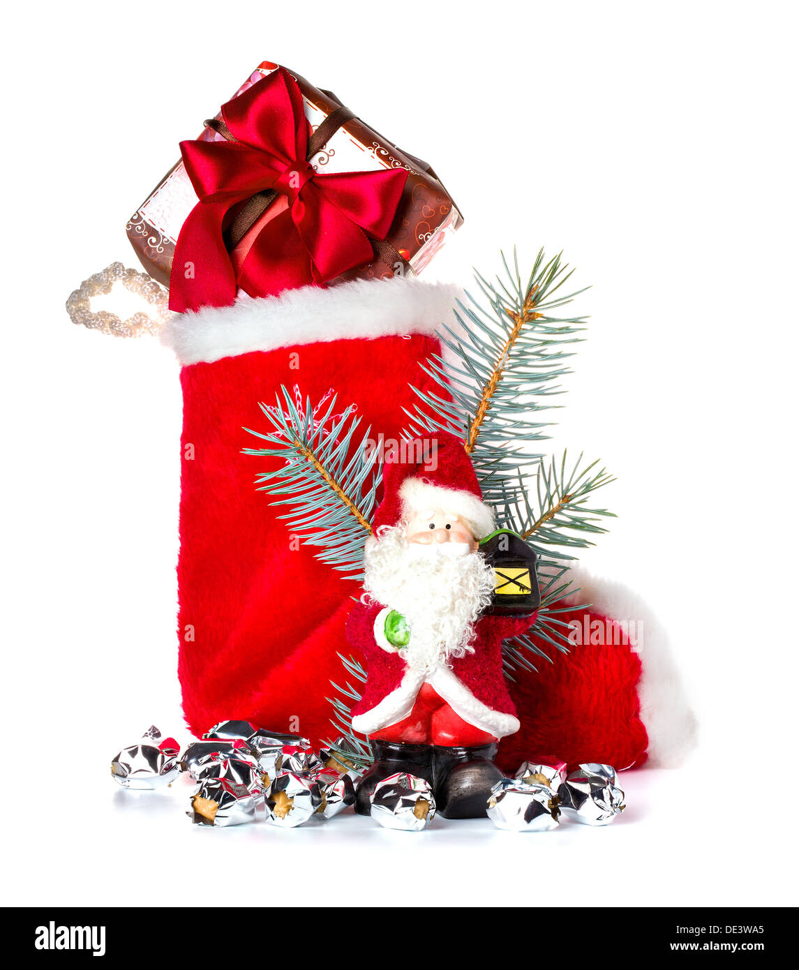 Red Christmas stocking and Santa Claus, Saint Nicholas, holiday ornament Stock Photo