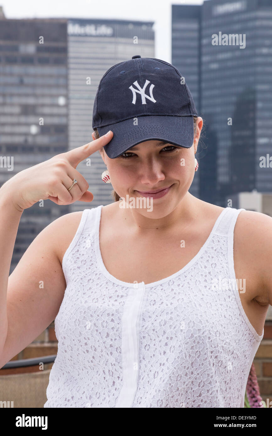MLB Yankees Baseball Female Fan in Midtown Manhattan, NYC Stock Photo
