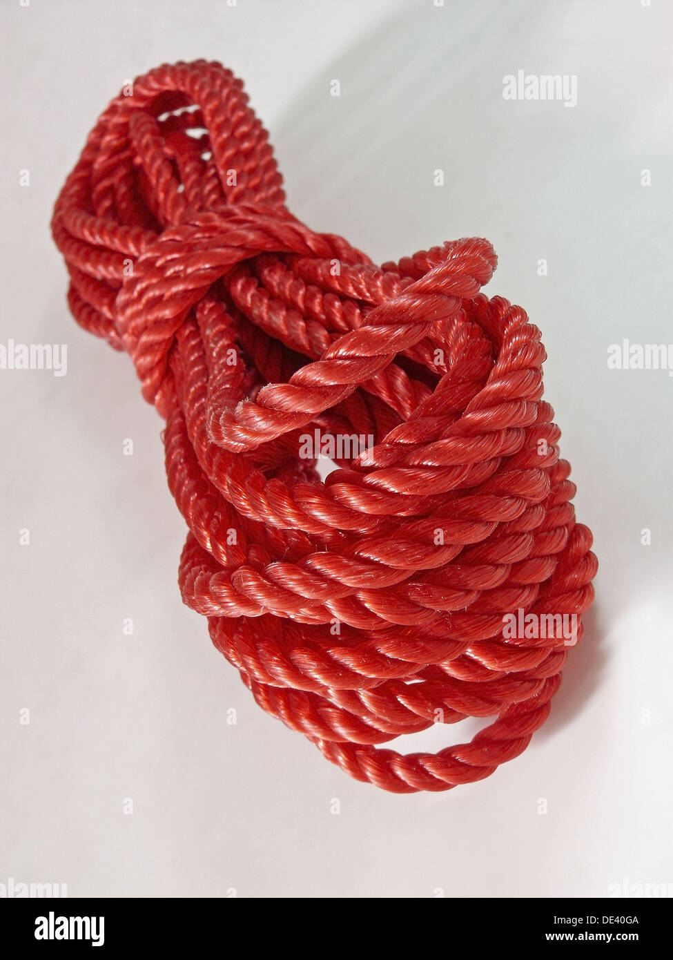 Close up of braided red nylon heavy duty commericial quality rope