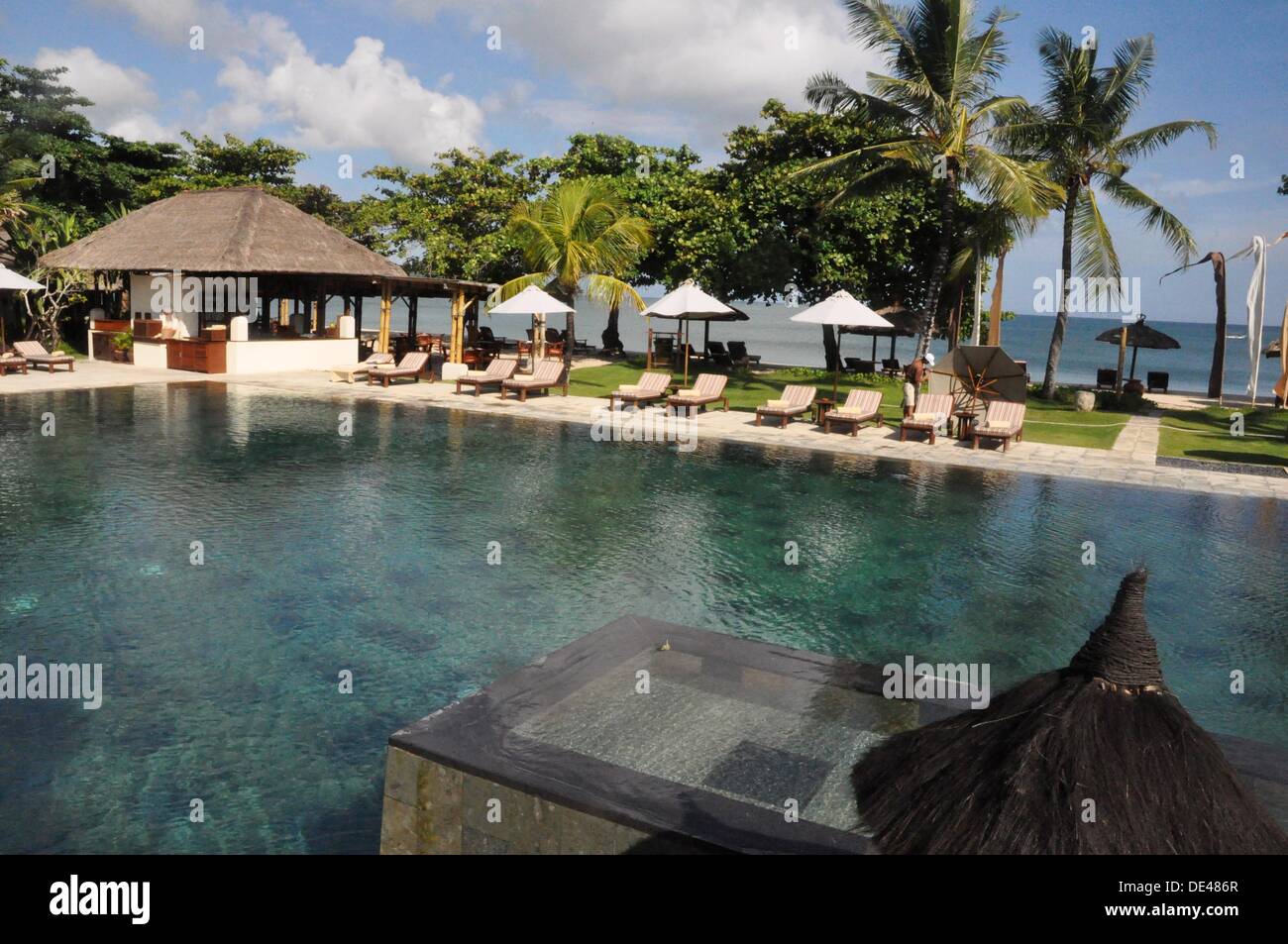 Jimbaran (Bali, Indonesia): the Jimbaran Puri Bali luxury resort´s swimming  pool Stock Photo - Alamy