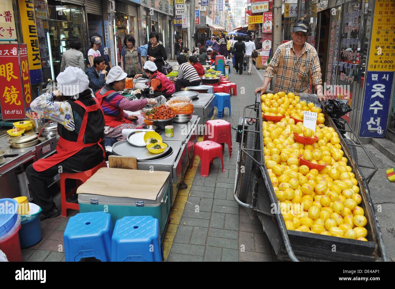 Busan (South Korea): street food stalls and melons seller in the Nampo