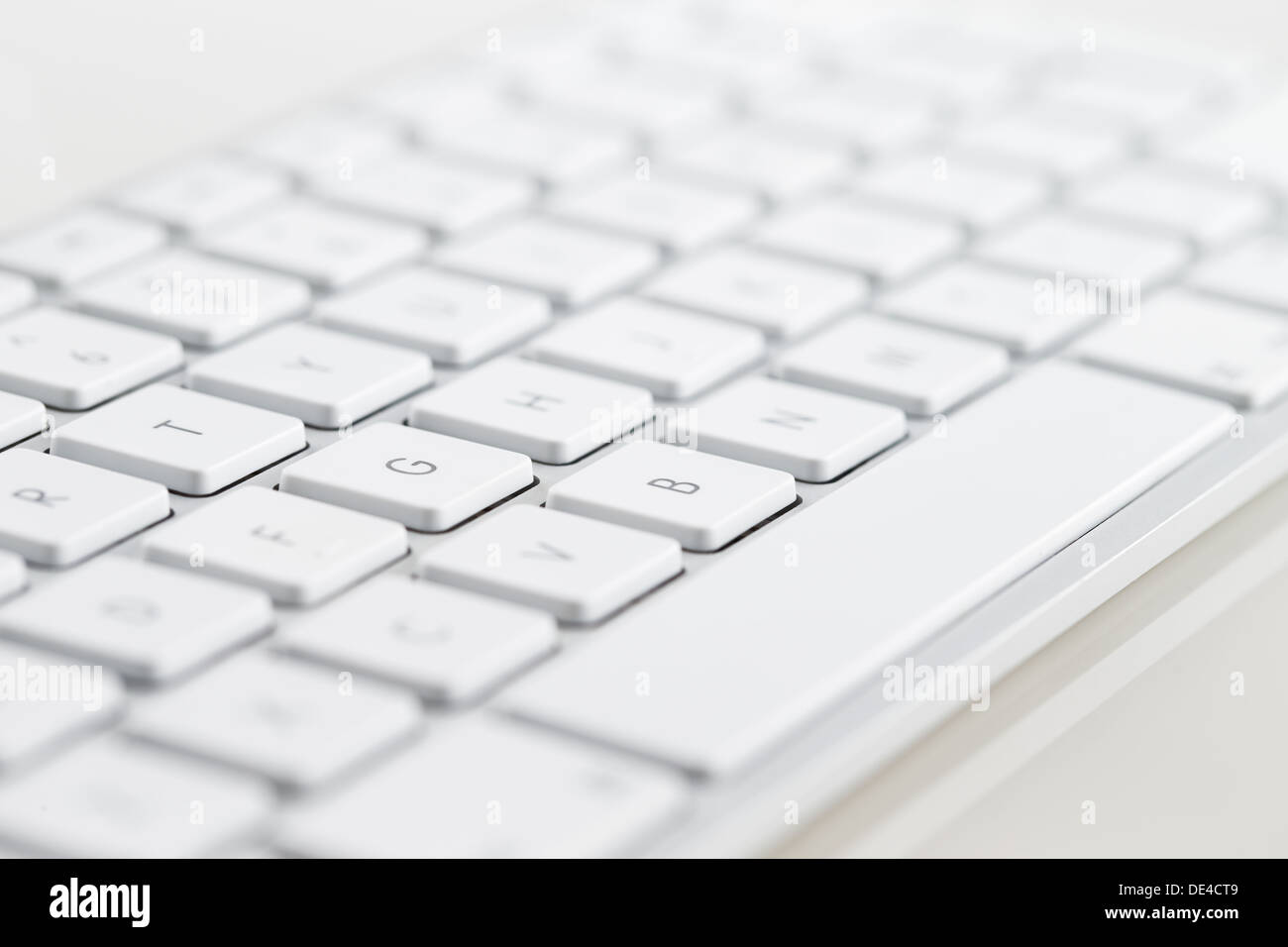 A close-up of a white computer keyboard on a white background Stock ...
