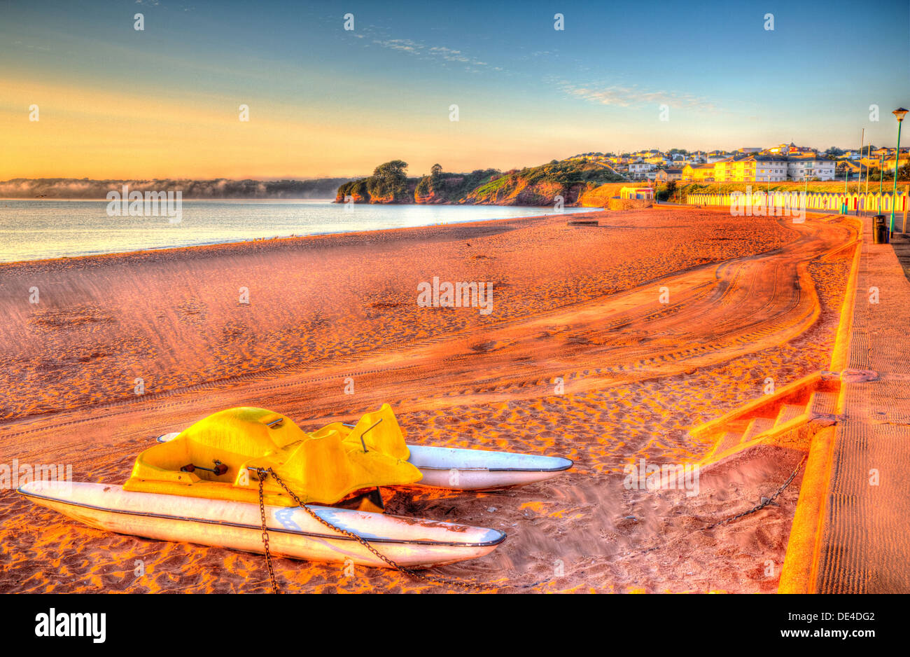 Pedalo paddle boat on golden beach with blue sky in HDR Stock Photo Alamy