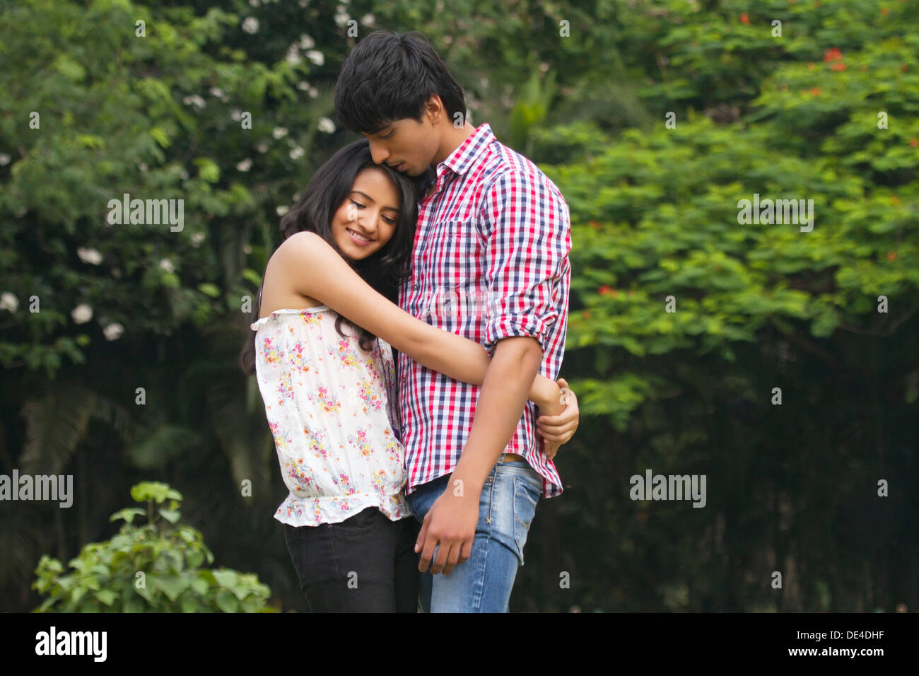 Holding each other hi-res stock photography and images - Alamy