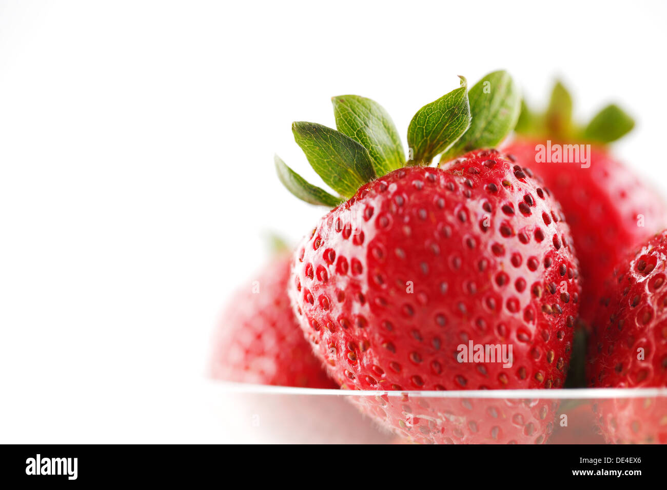 fresh organic strawberries on a white background Stock Photo - Alamy