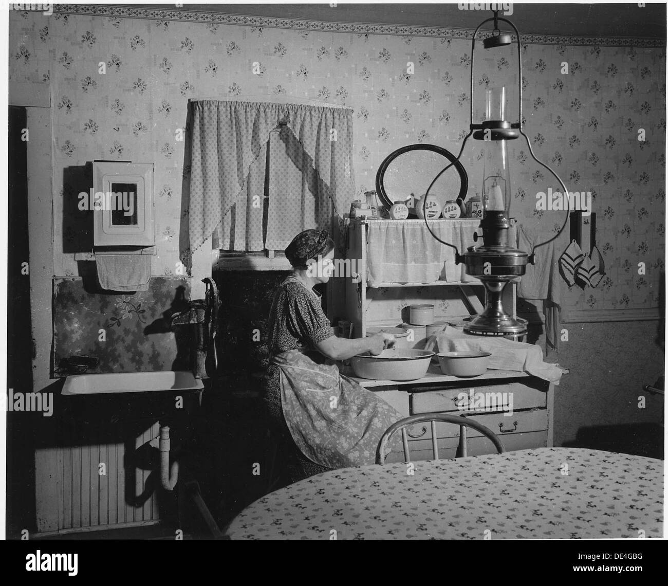 Shelby County, Iowa. This is the interior of a tenant farmhouse owned
