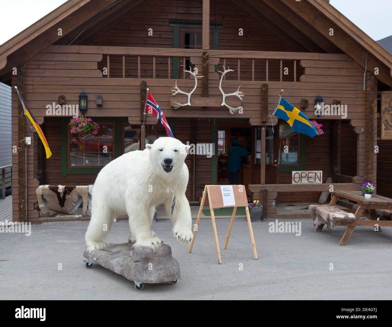 Stuffed polar bear outside of small tourist stop in Longyearbyen, Spitsbergen Island, Norway Stock Photo