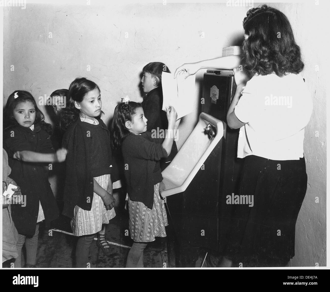 Taos County, New Mexico. Children wash their hands before lunch at the