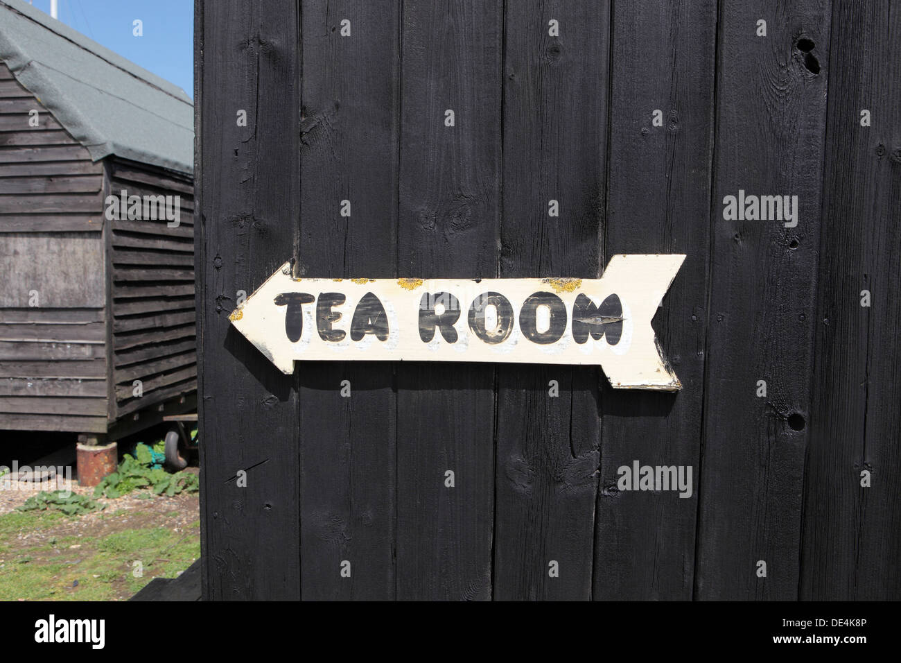 Hand painted sign signage pointing to 'Tea Room' cafe, Walberswick, Suffolk, UK Stock Photo