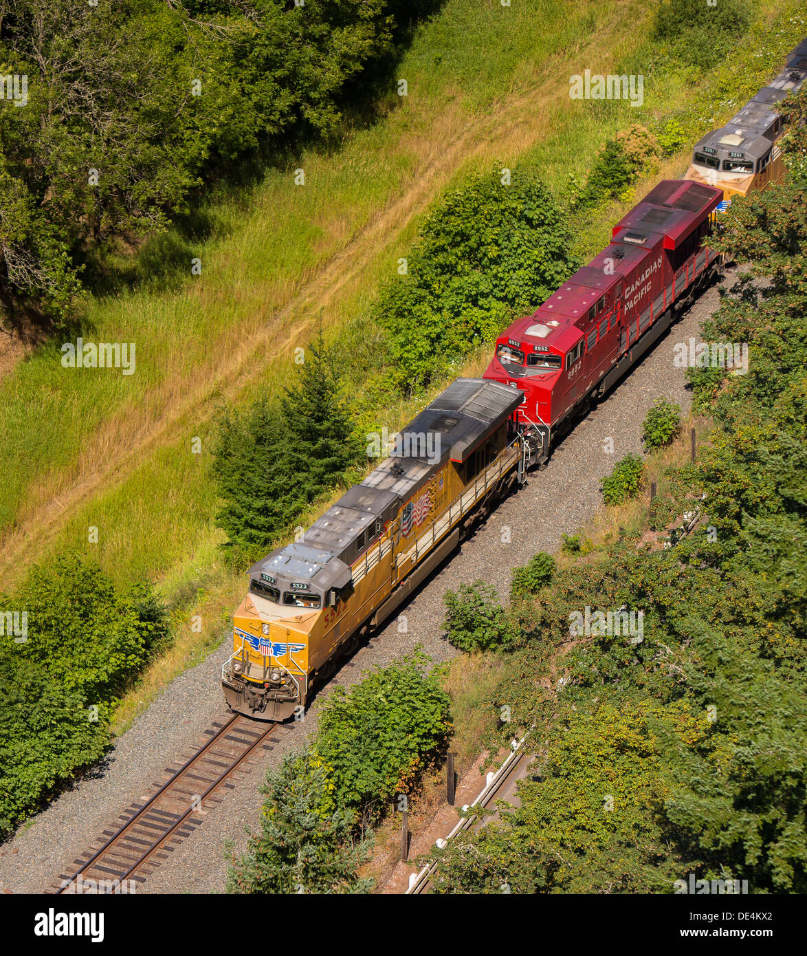 COLUMBIA RIVER GORGE, OREGON, USA - Railroad train locomotive, aerial view. Stock Photo