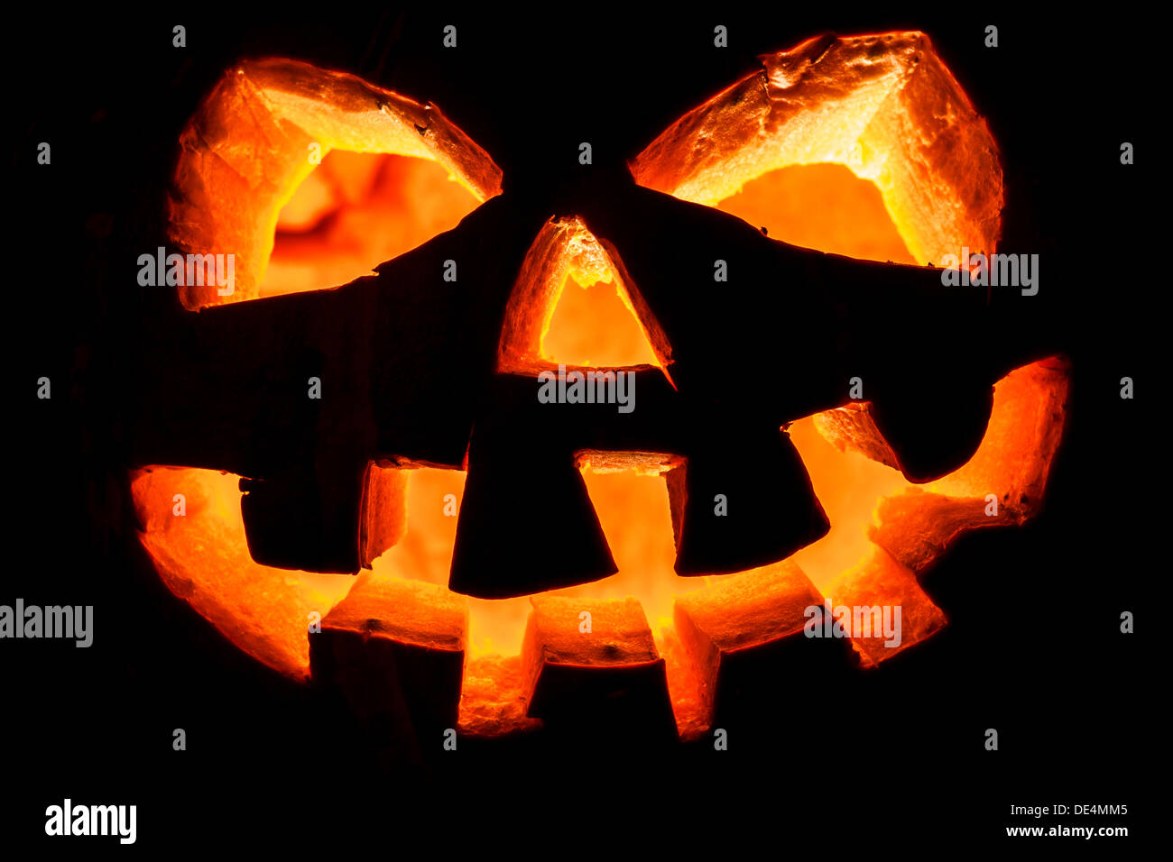 Halloween - old jack-o-lantern on black background Stock Photo