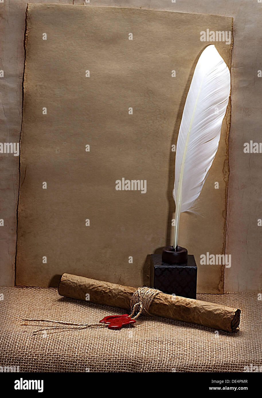 Parchment Paper And Brown Feather Quill Stock Photo - Download