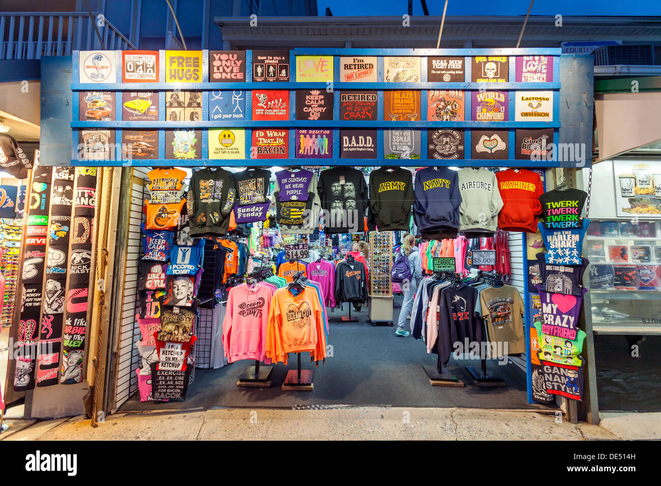 A souvenir store on an ocean boardwalk selling shirts and other items Stock Photo Alamy