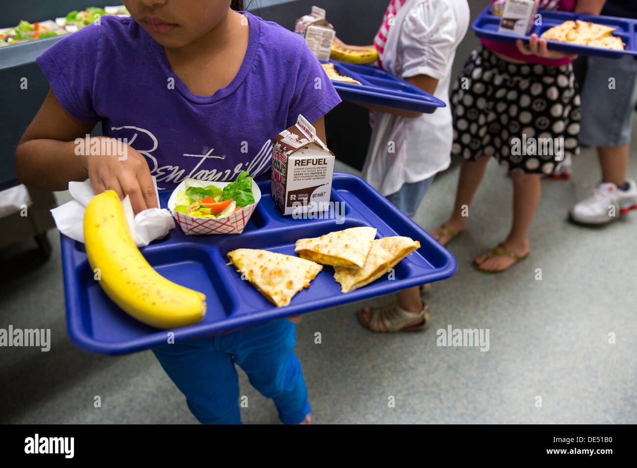 Students in line at an elementary school cafeteria. Stock Photo