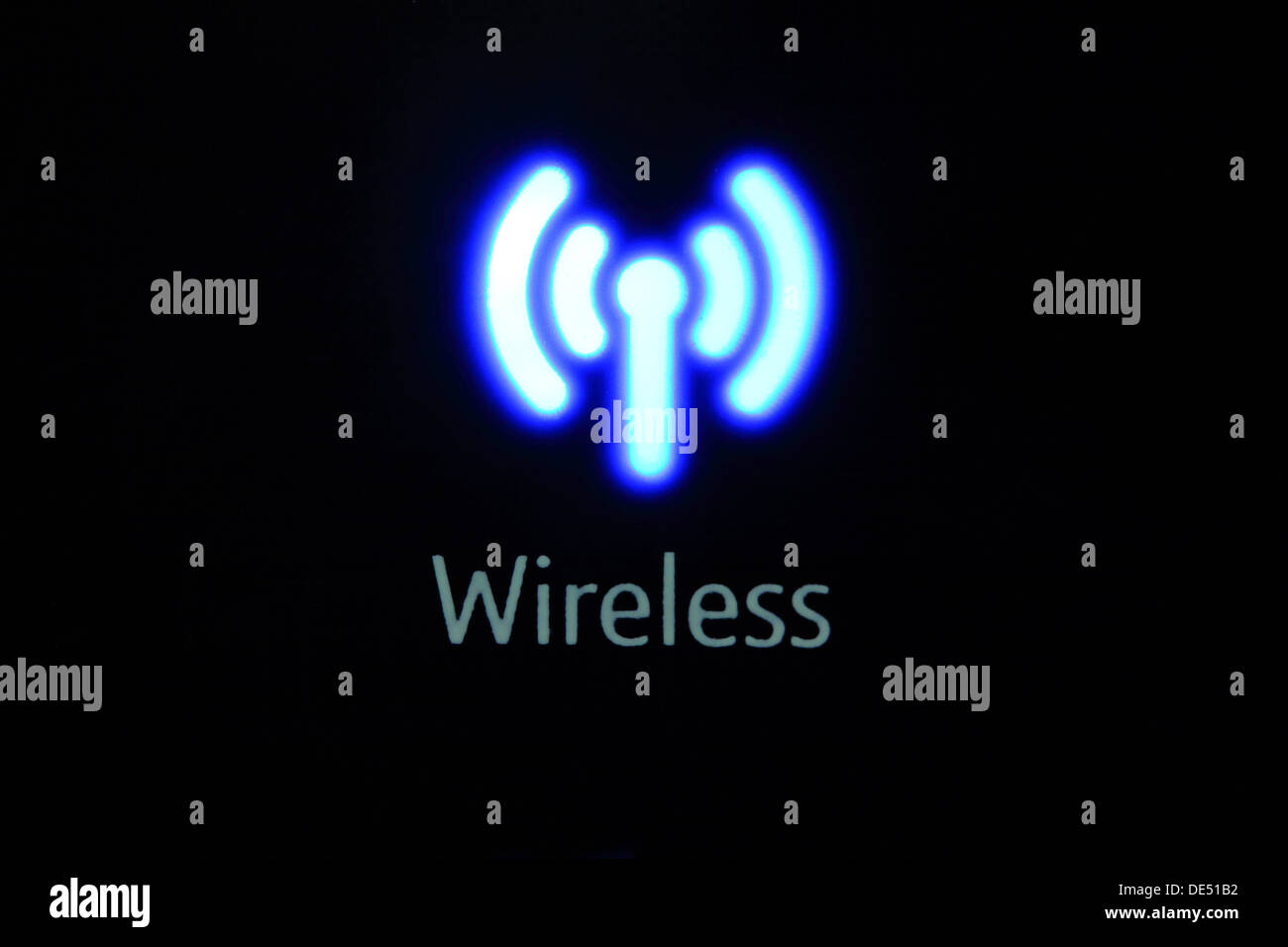 illuminated Wireless logo on a broadband router Stock Photo