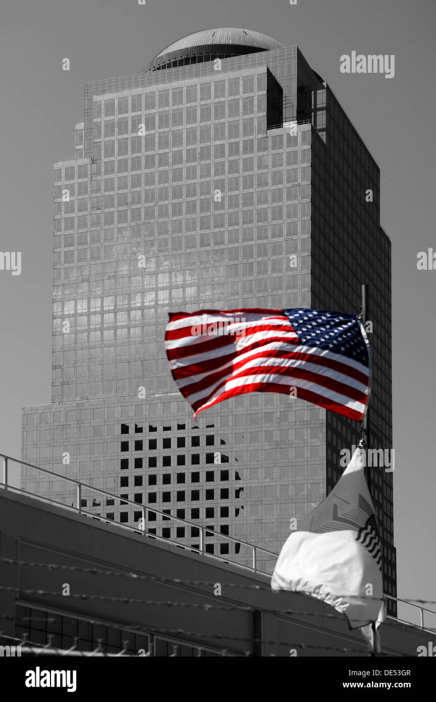 U.S. flag at Ground Zero in front of a skyscraper, New York City, New York, United States Stock Photo