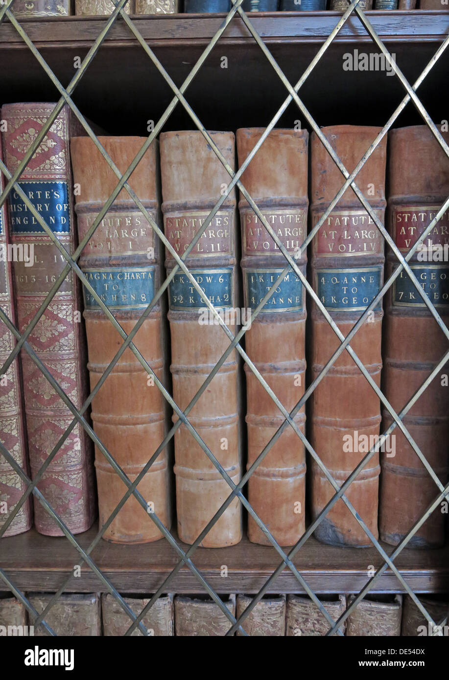 Old antique books in a library,locked away Stock Photo