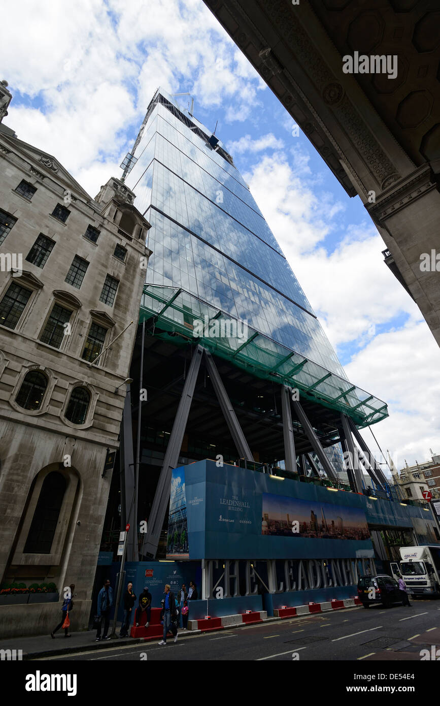 The Leadenhall building being built with focus on a bus stop lane Stock Photo