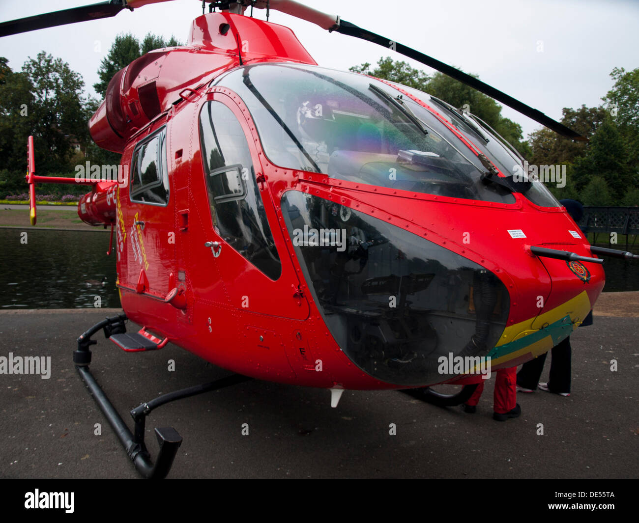 London, UK. 11th Sep, 2013. London's Air Ambulance, also known as London HEMS (Helicopter Emergency Medical Service), lands in Regent's Park in response to an injured casualty in Baker Street on 11th September 2013. Regent's Park is one of its designated landing areas in London. © PD Amedzro/Alamy Live News Stock Photo